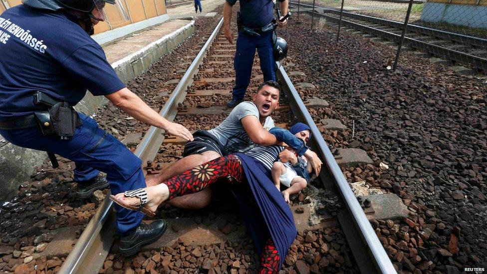 Migrant and police at Bicske, Hungary, 3 September 2015