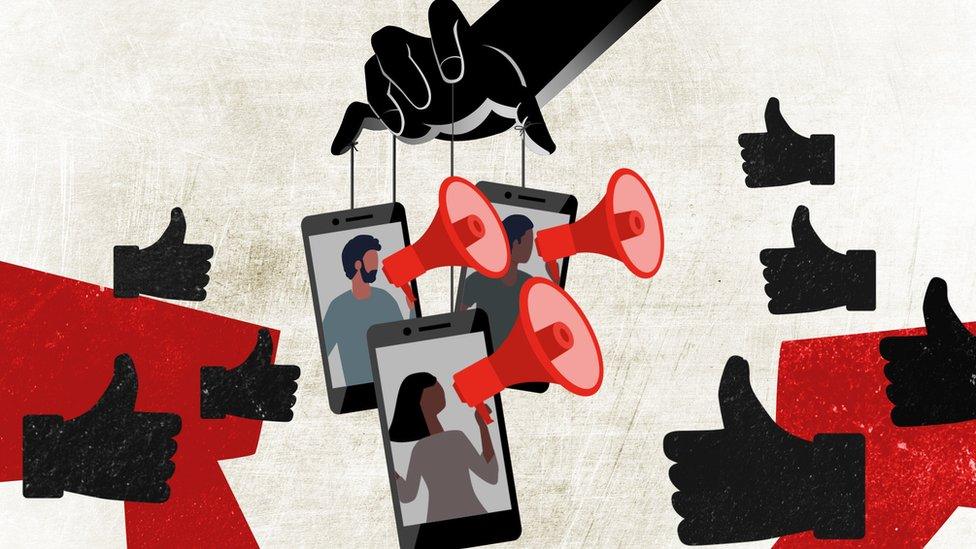 Illustration showing hand holding strings acting as puppeteer over three mobile phones, which contain a person using a speaker phone to symbolise influencers. Surrounded by thumbs up emoji icons