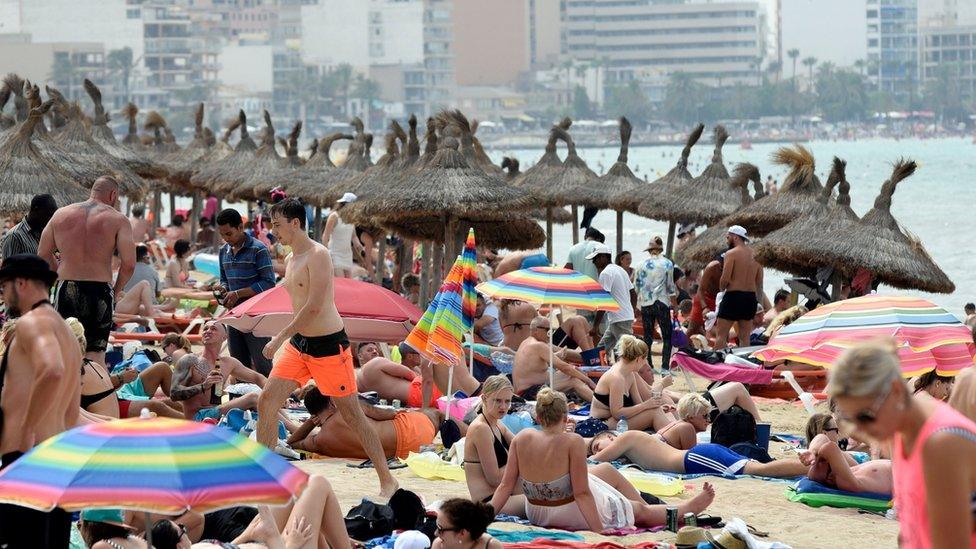 A view of Palma Beach stuffed full of tourists and locals in Palma Majorca, the Balearic islands, Spain, 08 July 2017.