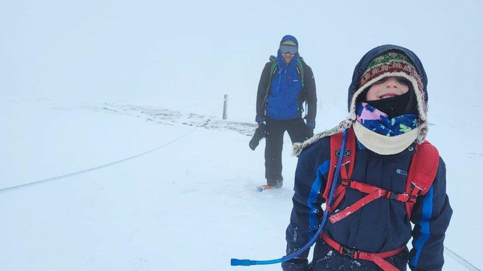 Oscar trekking through snow