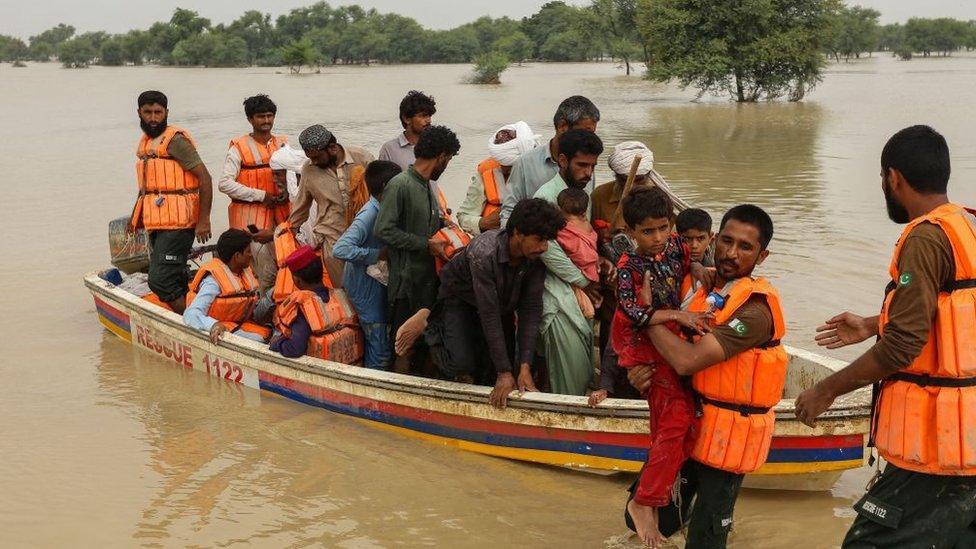 rescue-boat-flooding-pakistan.