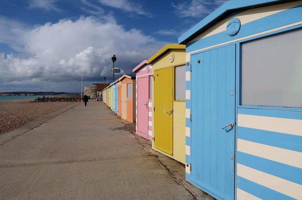 Row of colourful beach huts