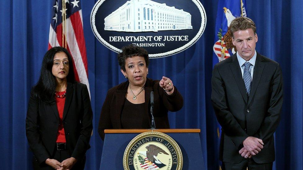 US Attorney General Loretta Lynch (C) speaks during a news conference.