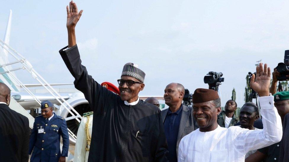 Mr Buhari waving at the airport