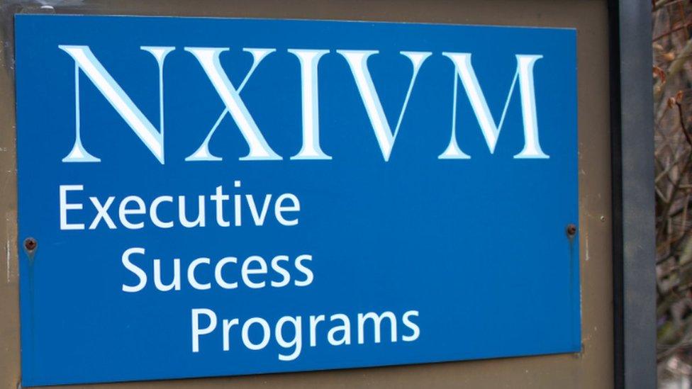 Nxivm sign in Albany, US