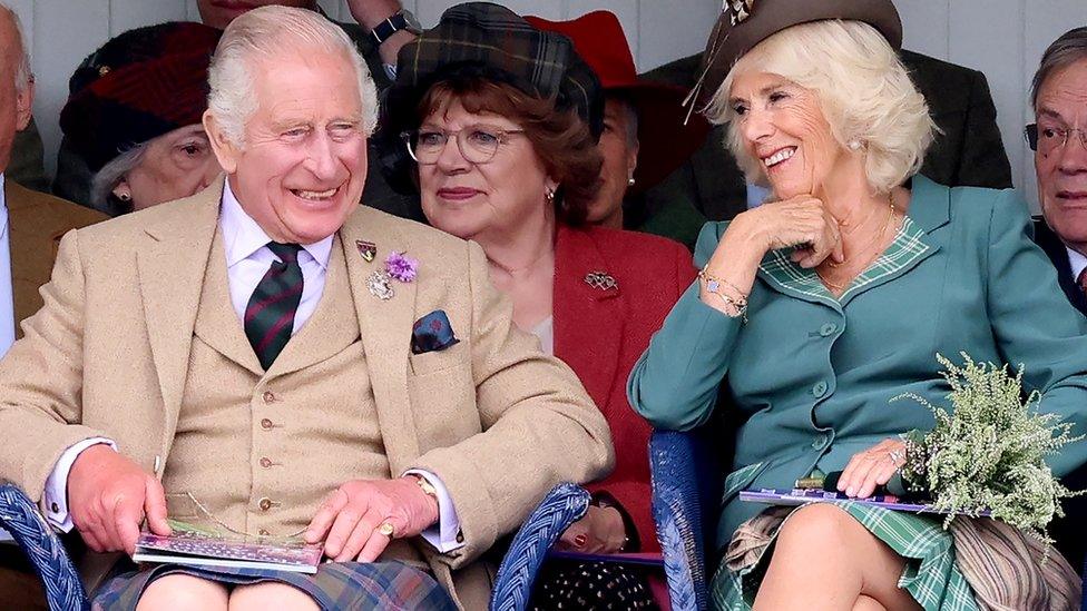 King Charles III (wearing, for the first time, a kilt made from the new King Charles III tartan) and Queen Camilla attend The Braemar Gathering 2023