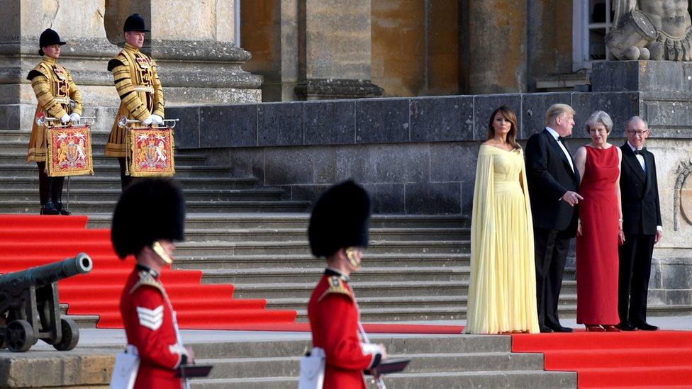 Donald Trump and the first lady are welcomed by the prime minister