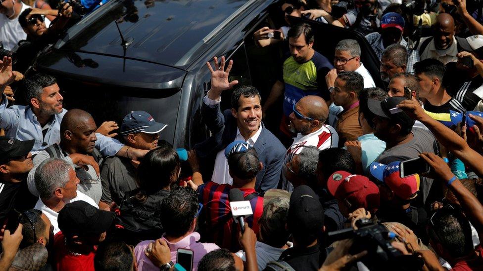 Venezuelan opposition leader Juan Guaido waves to supporters in Caracas, Venezuela February 2, 2019