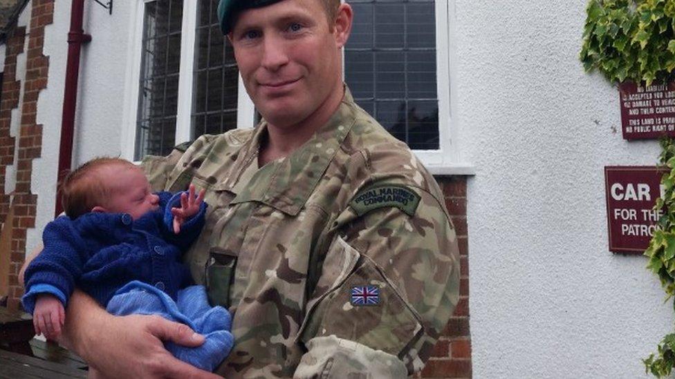 Sgt Matt Harness with baby Spencer