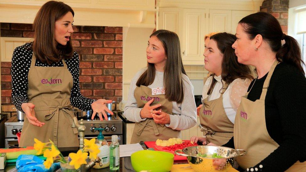 The Duchess of Cambridge with members of staff at Savannah House