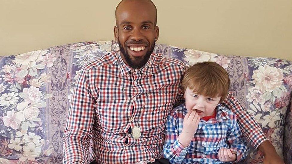 Michael Menafee (left) with Jaxson Slade, after meeting for the first time.