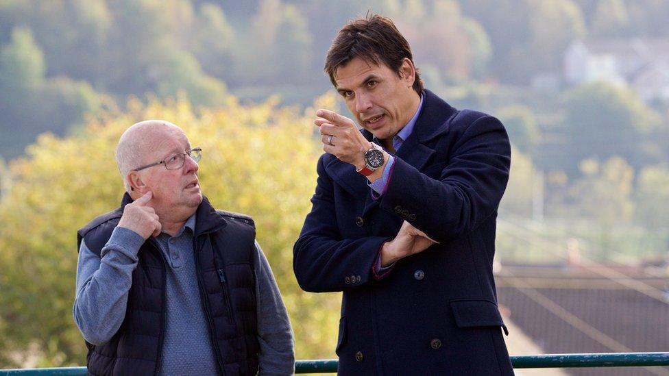 Chris Coleman talks to an Aberfan resident