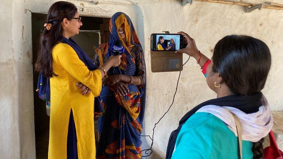 Nazni Rizvi (left) and Meera Devi (right) doing an interview