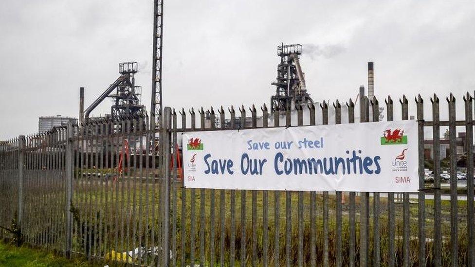 A Unite union banner on the fence outside the Tata steel plant in Port Talbot