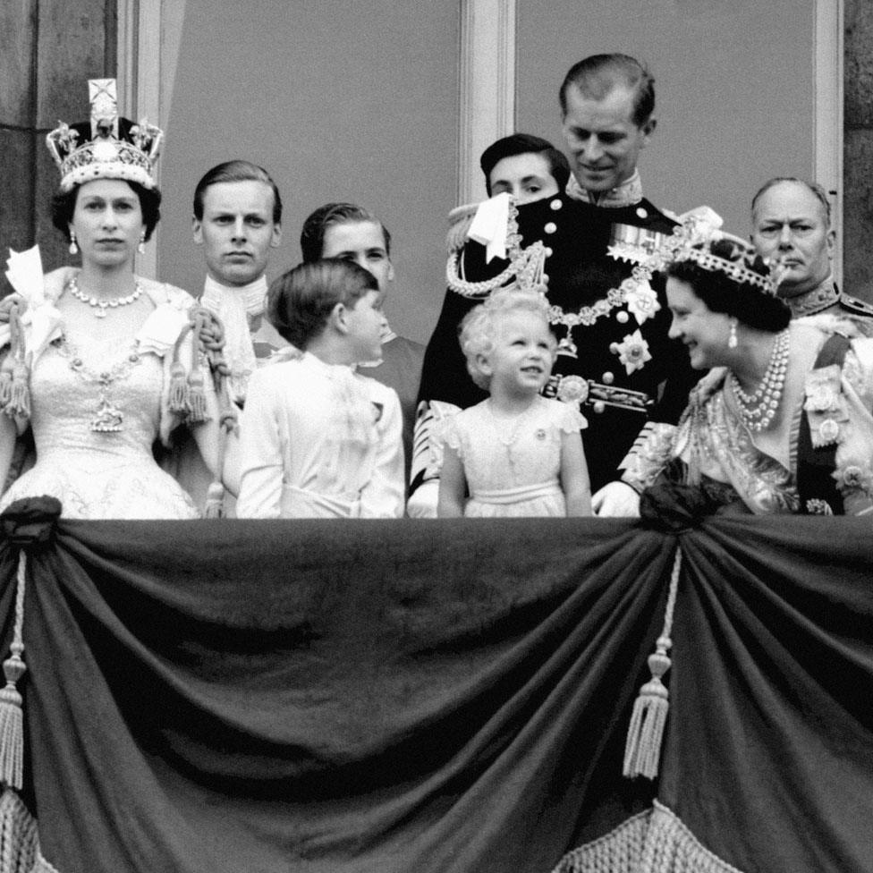 Queen Elizabeth II, Prince Charles, Princess Anne, the Duke of Edinburgh, the Queen Mother, and the Duke of Gloucester on the balcony of Buckingham Palace to view the fly past of the Royal Air Force after the Coronation