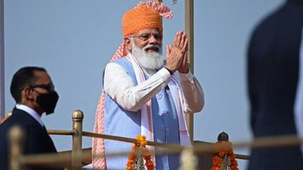 India's Prime Minister Narendra Modi gestures after addressing the nation from the ramparts of the Red Fort during the celebrations to mark countrys 75th Independence Day in New Delhi