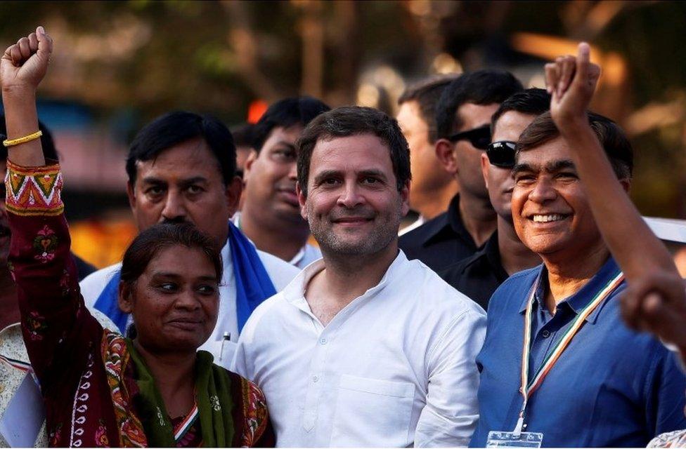 Rahul Gandhi, Vice-President of India's main opposition Congress Party, poses with his supporters during a rally ahead of Gujarat state assembly elections, at a village on the outskirts of Ahmedabad, India, November 24, 2017.