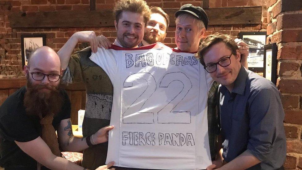 Bag of Cans hold up a homemade Fierece Panda t-shirt together with Simon Williams