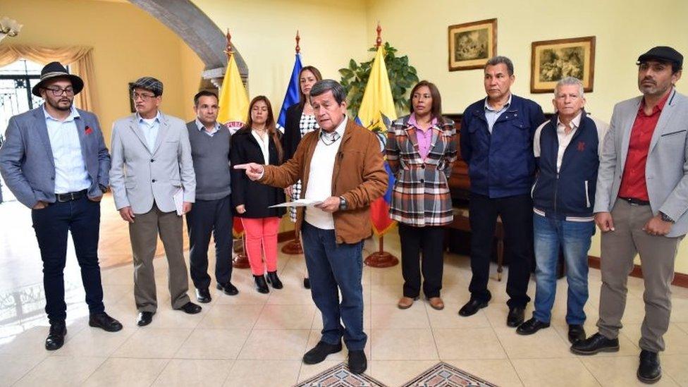 The chief negotiator of the ELN guerrilla in the talks with the Colombian government, Pablo Beltran (C), reads a statement calling the government of President Juan Manuel Santos to reconsider its withdrawal from peace negotiations. Quito, 10 Jan 18