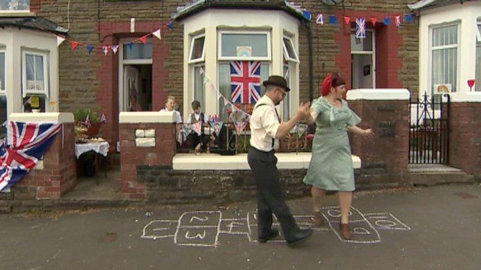 People enjoying a street party