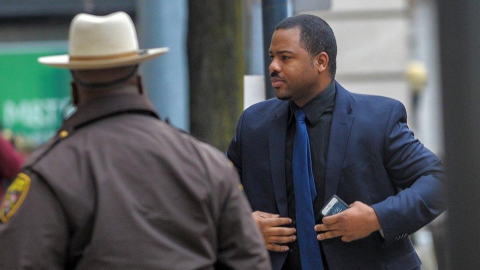 Officer William Porter arrives at the courthouse in Baltimore, December 16, 2015. Porter is one of six officer charged connection with the death of Freddie Gray.