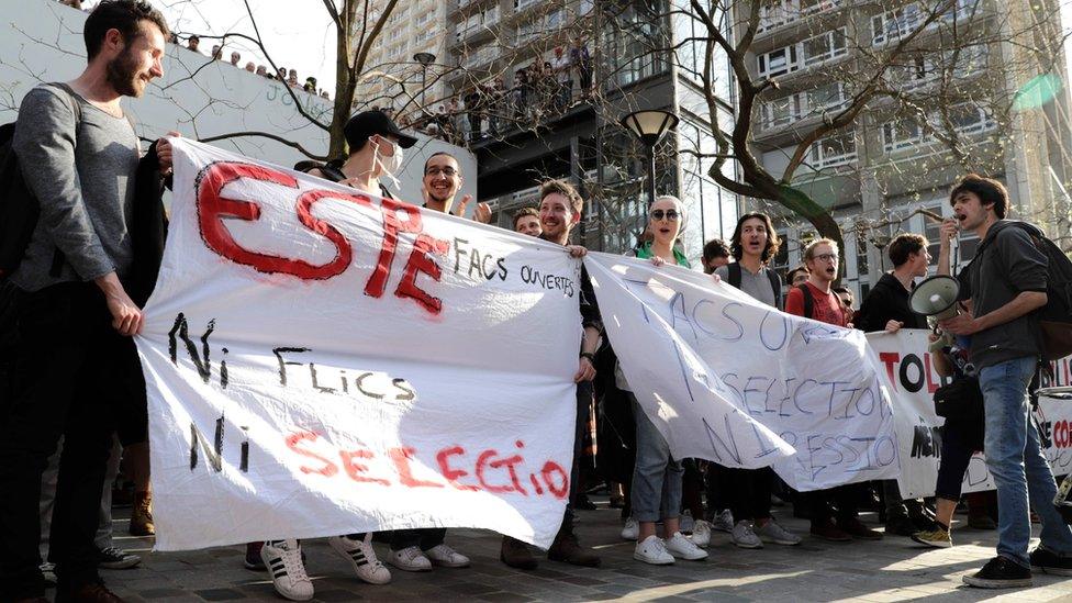 Students gather in front of the Paris Tolbiac university campus on April 20, 2018 in Paris after police evacuated the university in the early morning