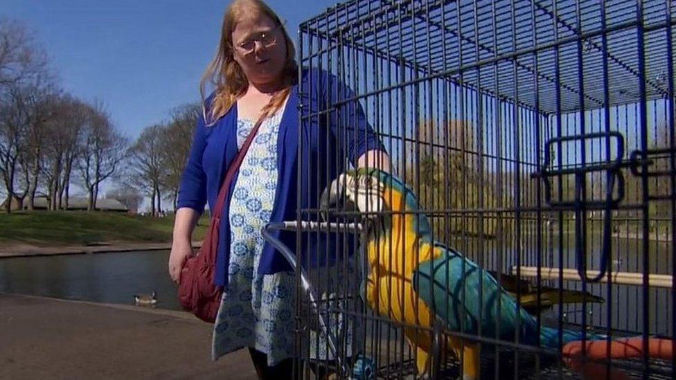 Woman and parrot