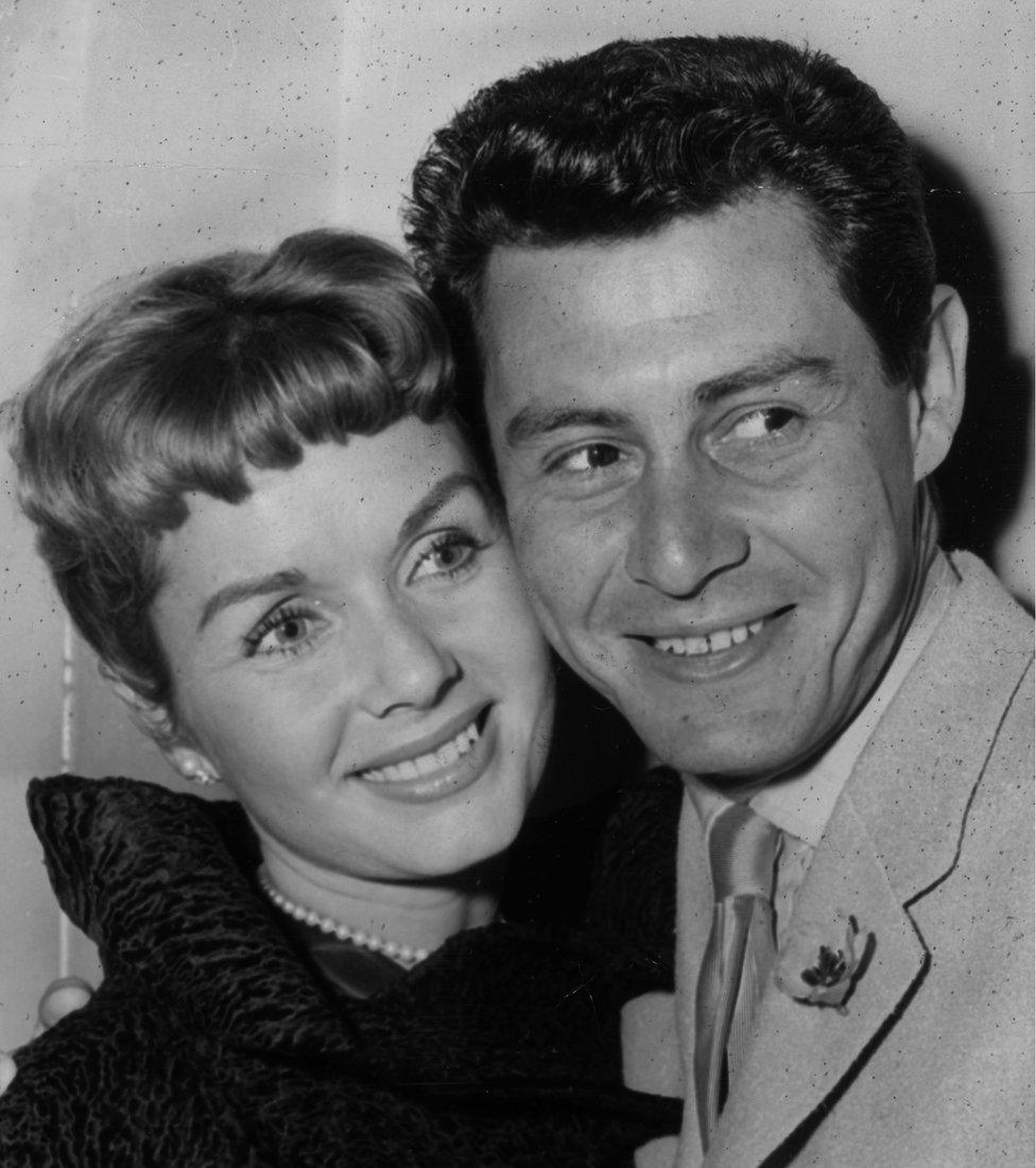 4th June 1957: American singing star Eddie Fisher and his wife, film star Debbie Reynolds at a press reception. Eddie Fisher is to appear at the London Palladium in mid-June.