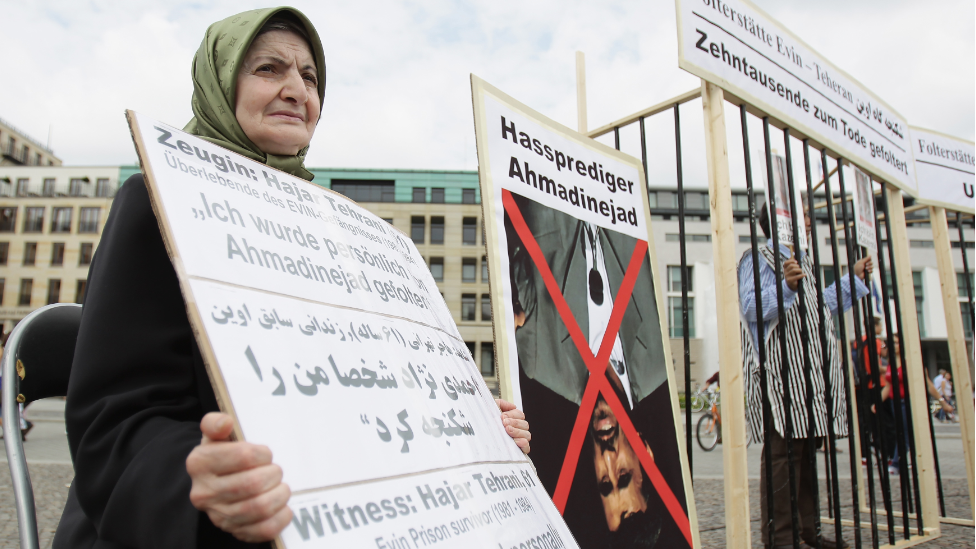 This picture shows Hajar Tehrani, Evin prison survivor (1981-1984) protesting against stoning in Berlin, Germany