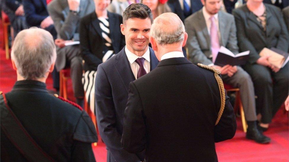 James Anderson is presented with his medal by Prince Charles at Buckingham Palace