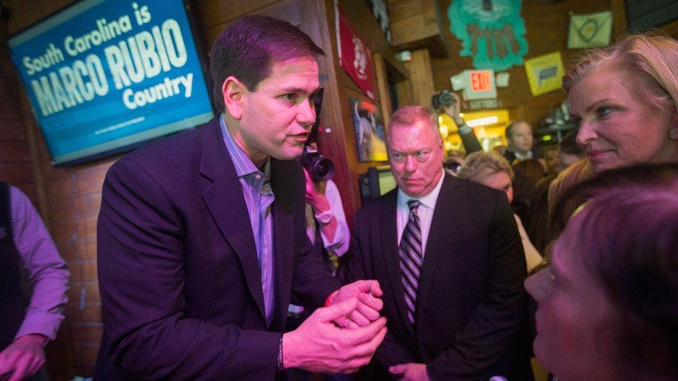 Republican presidential candidate Sen. Marco Rubio (R-FL) greets guests during a campaign rally at the Water Dog Grill on January 13, 2016 in Mount Pleasant, South Carolina.