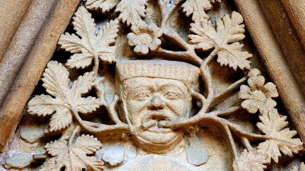 Green man carving