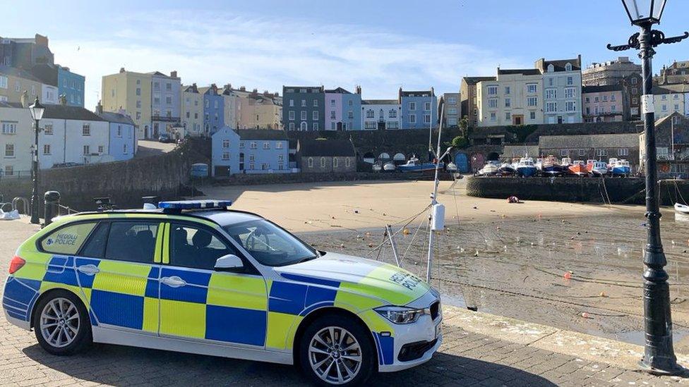 police car in Tenby harbour