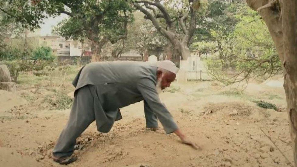 Mohammad Shareef just finishing a burial