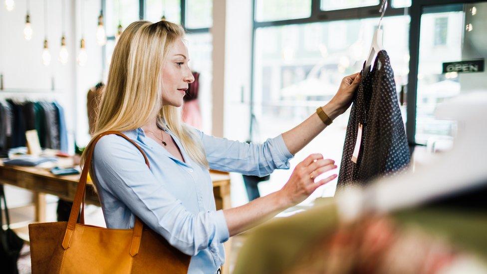 Woman shopping for clothes