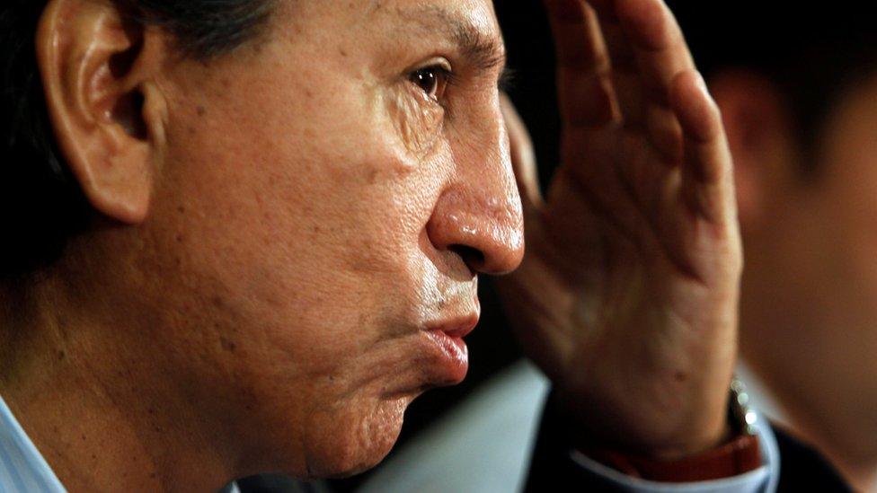 Former president Alejandro Toledo speaks to the media in Lima, January 27, 2011.