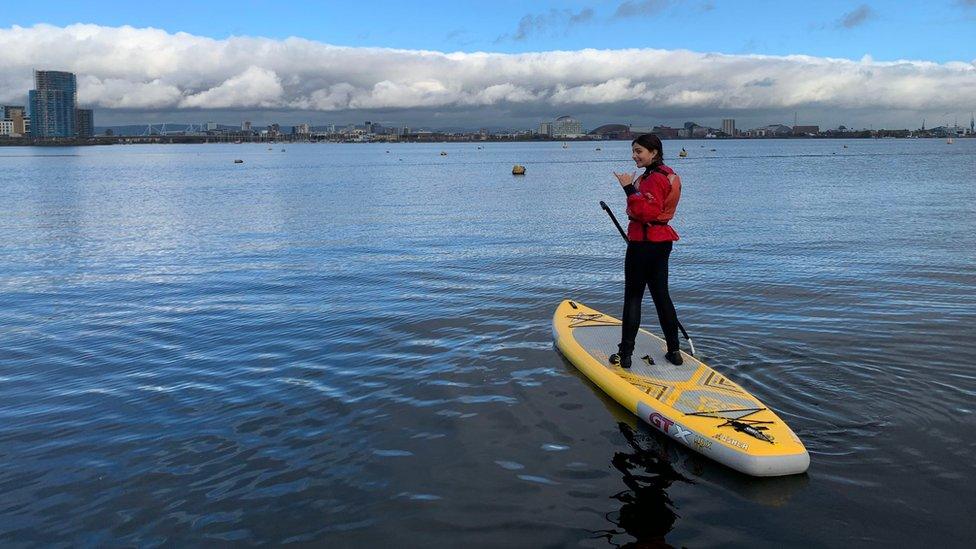 Girl paddleboarding