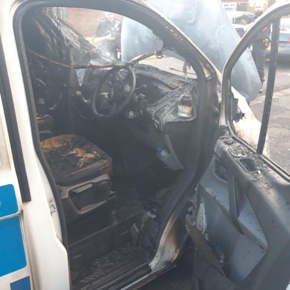 The inside view of the fire-damaged van