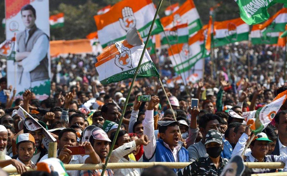 Indian Congress party supporters shout in support of Indian National Congress party President Rahul Gandhi at a public rally in Guwahati on February 26, 2019.