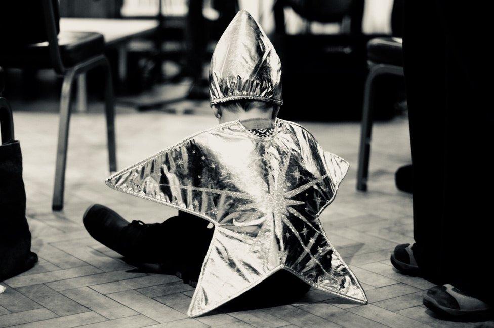 A boy in a star costume