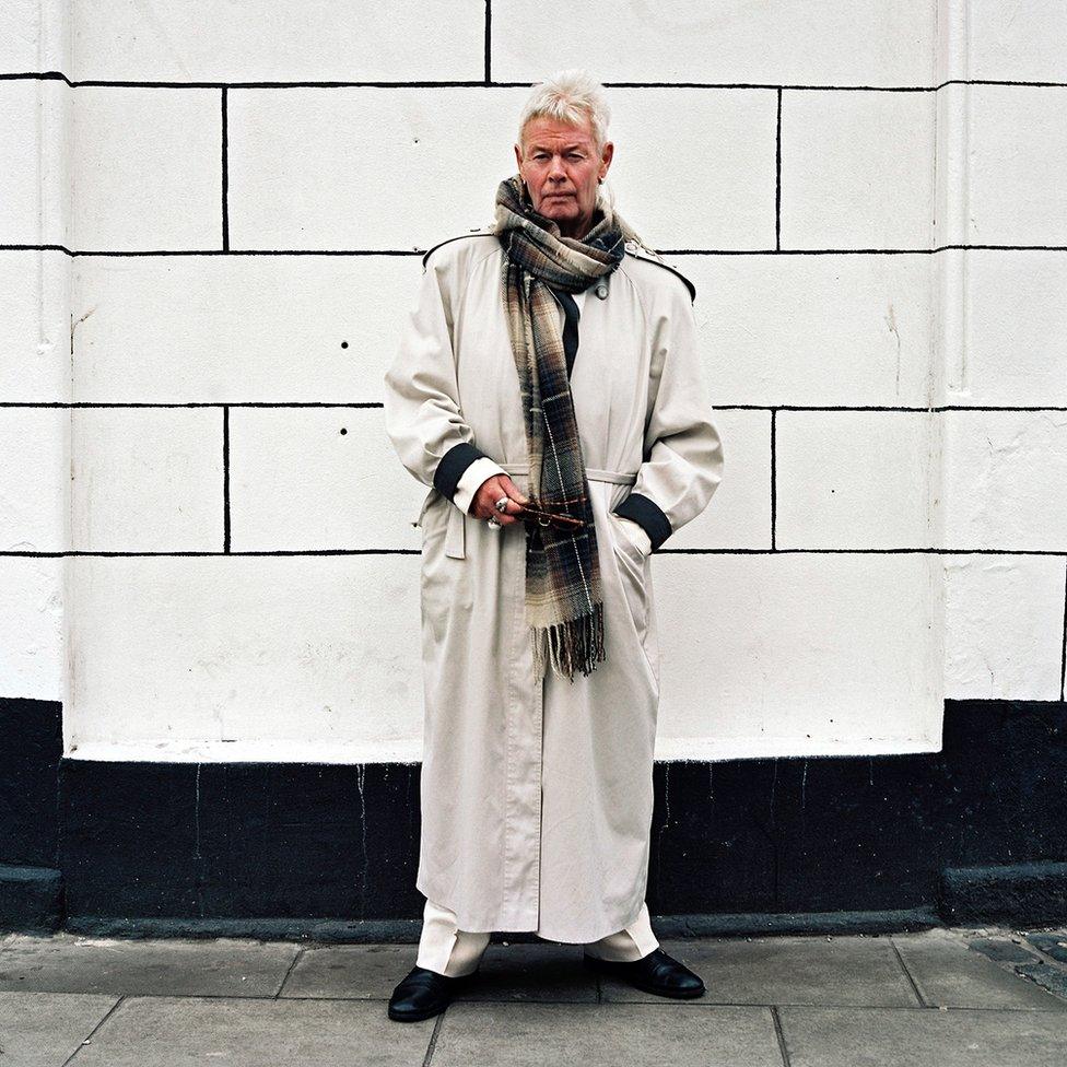 Man in a long white coat