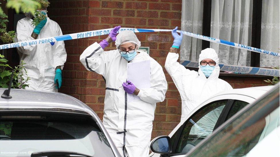 Forensic officers at scene