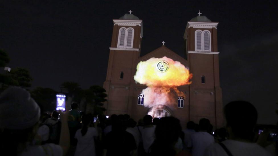 An image of a mushroom cloud is projected on to the Urakami Cathedral on the eve of the bombing's anniversary - 8 August 2015