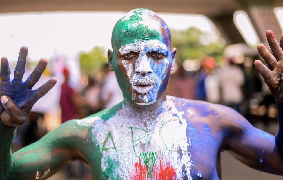 Man with APC body paint