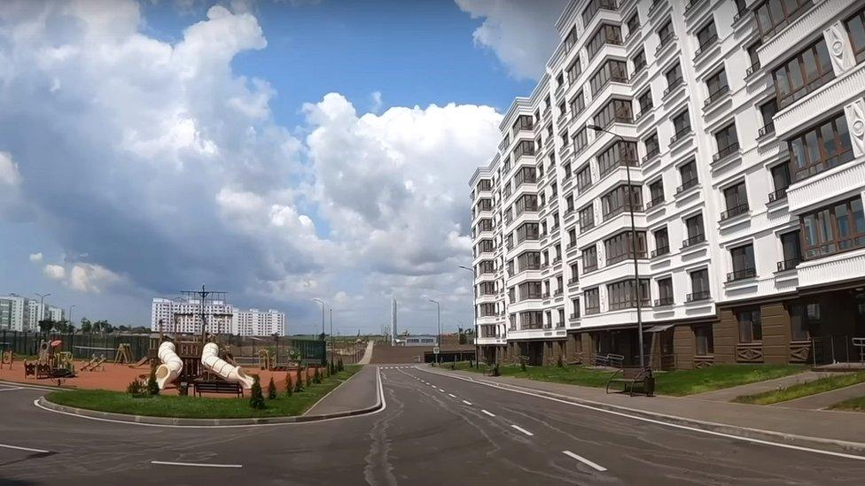 A screenshot from a YouTube video shows the Nevsky new-build residential complex in the Russian-occupied city of Mariupol, Ukraine.