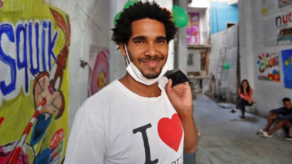 Luis Manuel Otero Alcantara, leader of the San Isidro Movement (MSI), poses for a picture minutes at his home in Havana on 5 April