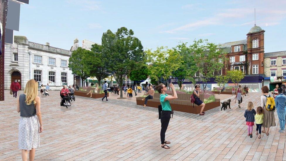 An artist's impression of the regeneration of Great Yarmouth town centre, showing people enjoying the outside