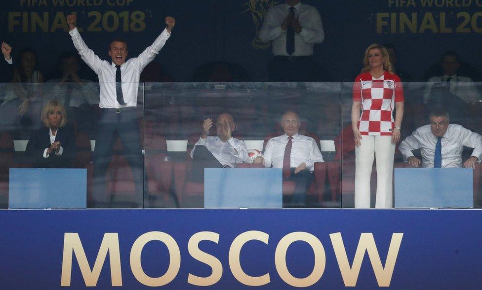 French President Emmanuel Macron celebrates France's win over Croatia in the 2018 World Cup final, 15 July 2018