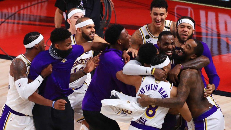 The LA Lakers celebrate their win