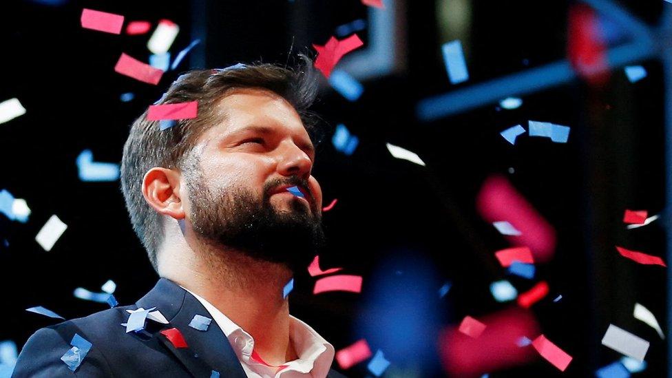 Chile's President-elect Gabriel Boric celebrates with supporters after winning the presidential election in Santiago, Chile